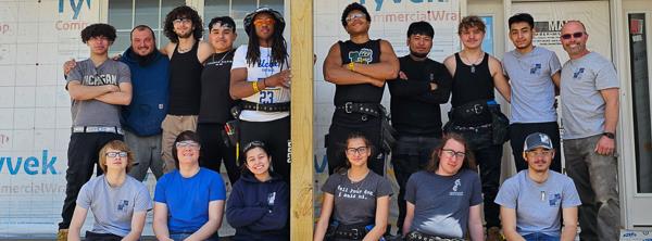 Homebuilding students from across the district gather on the jobsite porch