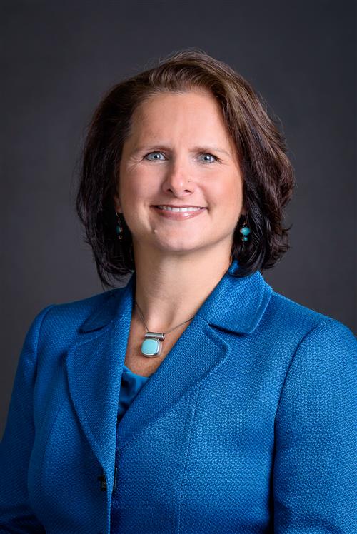 Marci Tuzinsky headshot